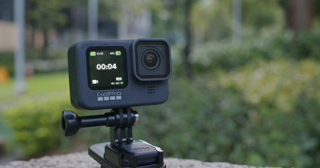 Hong Kong 22 September 2020: gopro on green meadow