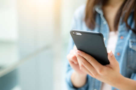 Woman use of mobile phoneの写真素材