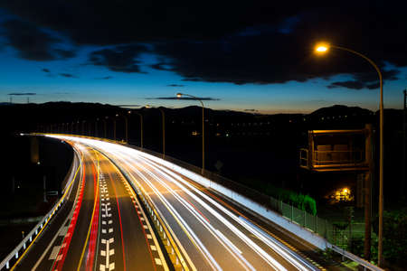 Light trails of evening highwayの写真素材