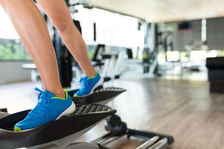 Woman practice on Elliptical machineの写真素材