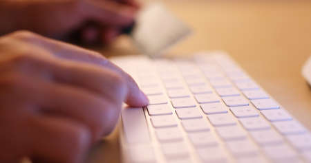 Using laptop computer to pay the billの写真素材