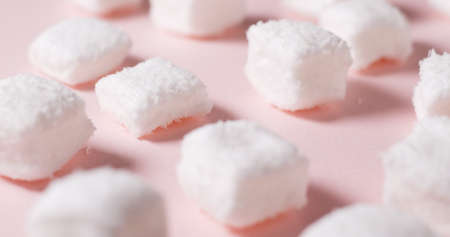 Marshmallow candy on pink backgroundの写真素材