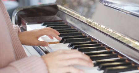 Playing piano close upの写真素材