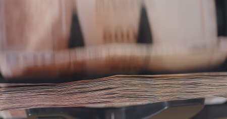 Counting machine of Hong Kong bill close upの写真素材