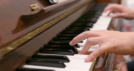Man practicing pianoの写真素材