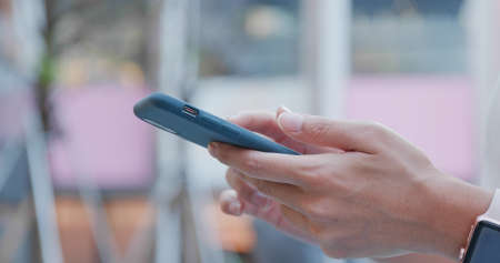 Woman use of mobile phone