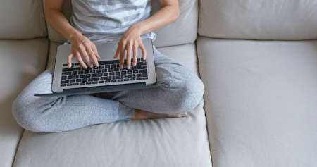 Woman type on computer