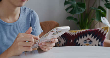 Woman use of cellphone in coffee shop