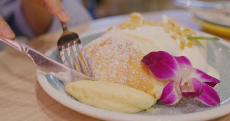 Souffle Pancake with cream and maple syrupの写真素材