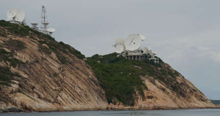 Satellite receiver dish on mountainの写真素材