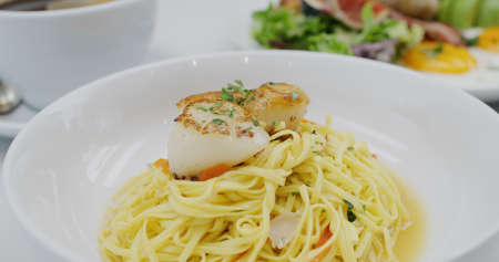 Fresh scallop pasta in coffee shopの写真素材