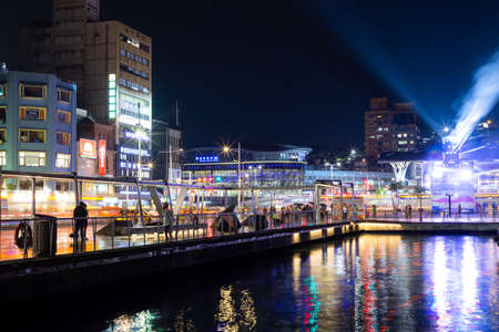 New Taipei, Taiwan 12 June 2022: Inner Harbor of Keelung city at nightの写真素材
