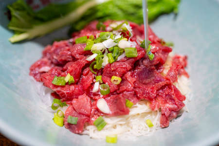 Noodle with slice of raw beef, famous cuisine in Kinmen of Taiwanの写真素材