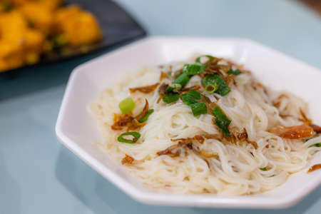 Green onion oil noodles in restaurantの写真素材