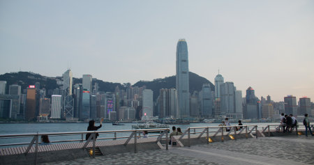 Tsim Sha Tsui, Hong Kong 14 April 2021: Hong Kong city at sunsetのeditorial素材