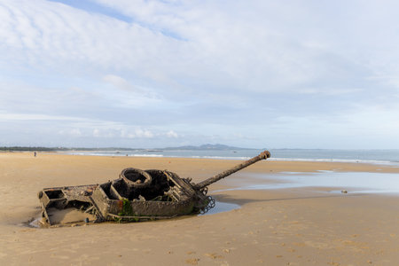 Ruined tank on the sand beach in Kinmen of Taiwanの写真素材