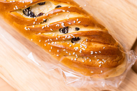 Raisin bread over the wooden board