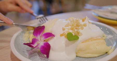 Souffle Pancake with cream and maple syrupの写真素材