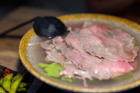 Rice noodle with slice of raw beef, famous cuisine in Kinmen of Taiwanの写真素材