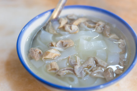 Pork intestine rice flat noodle in restaurantの写真素材