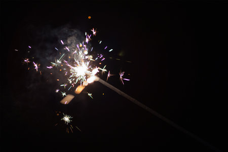 Play sparkler and burning at nightの写真素材