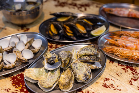 Mixed seafood barbecue on grill panの写真素材