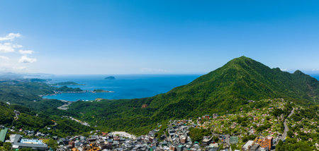 Drone fly over Jiufen village on the mountain in Taiwanの写真素材