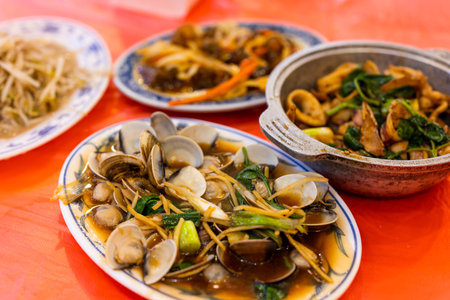 Taiwanese local cuisine with different dishes in seafood storeの写真素材