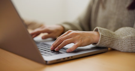 Woman work on laptop computer on working desk