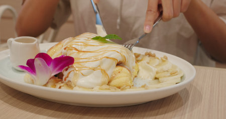 Souffle Pancake with cream and maple syrupの写真素材