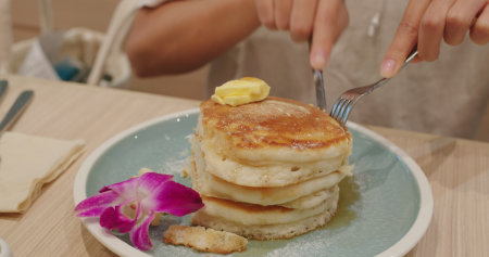 Pancake with maple syrup and butterの写真素材