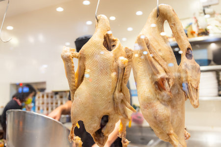 Goose hanging in the kitchenの写真素材