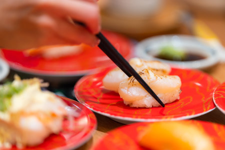Scallop sushi dish in Japanese restaurantの写真素材