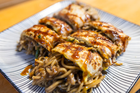 Fry noodle omelet in street market of Taiwanの写真素材