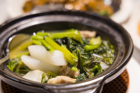Asian cuisine Chinese style Lettuce with chicken soup bowlの写真素材