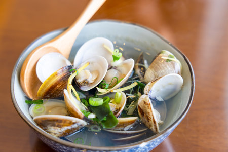 Steamed clam with soup in bowl at Japanese restaurantの写真素材