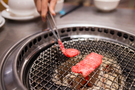 Grilled beef in Japanese yakiniku restaurantの写真素材