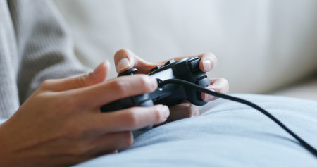 Woman play tv game at home