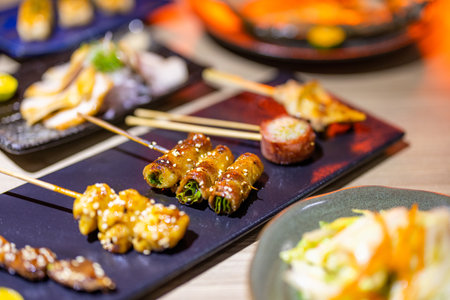 Japanese restaurant with lots of different grilled Skewerの写真素材