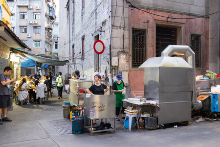 Macau, 28 June 2023: Local food store in the street at Macau cityの写真素材