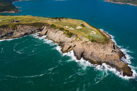 Top view of golf court by the seaの写真素材
