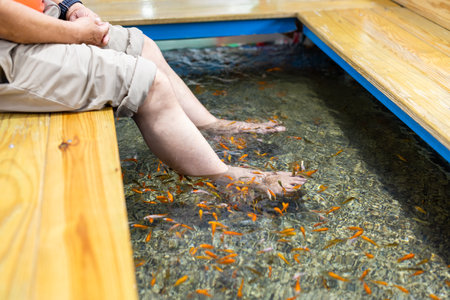 Pedicure fish foot bath spa treatment at outdoor