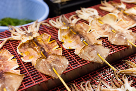 Grill squid in the street marketの写真素材