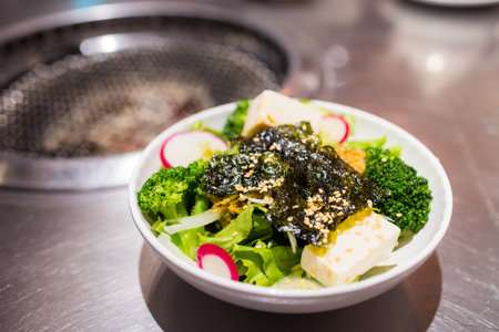 Salad with seaweed in the restaurantの写真素材