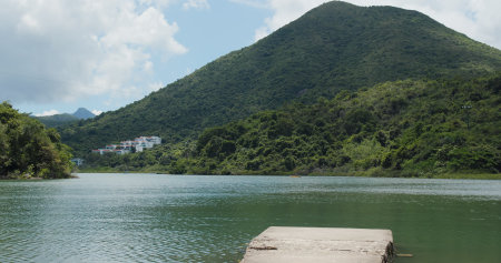 Mountain and sea with pierの写真素材