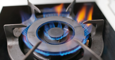 Gas burning from a kitchen gas stoveの写真素材