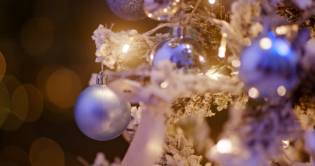 Christmas tree decoration with light in blue color at nightの写真素材