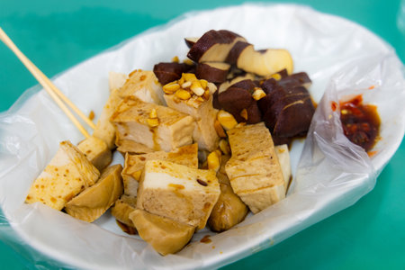 Dish with slice of tofu