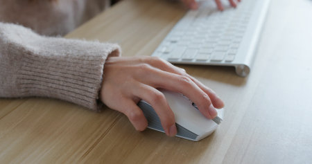 Woman using computer at officeの写真素材