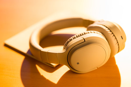 Headphone on the table under the sunlight